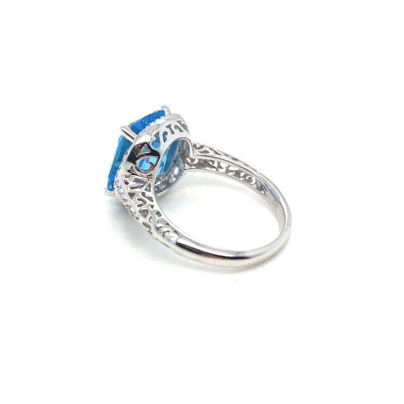 a ring with blue stones on it
