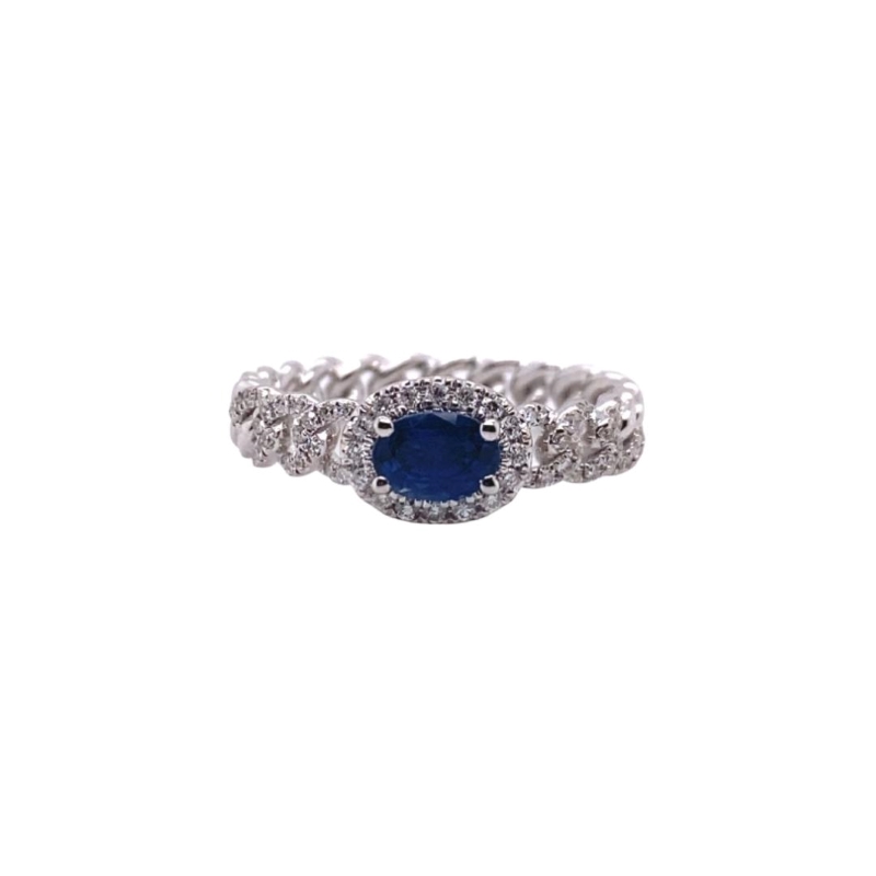 a white gold and blue sapphire ring