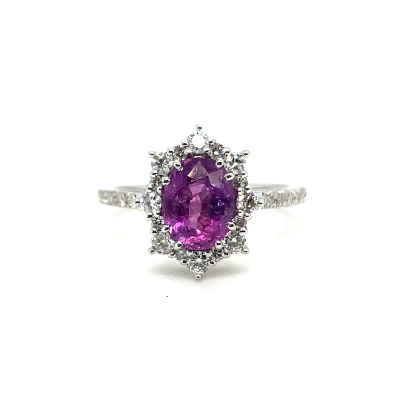 an oval shaped purple sapphire and diamond ring