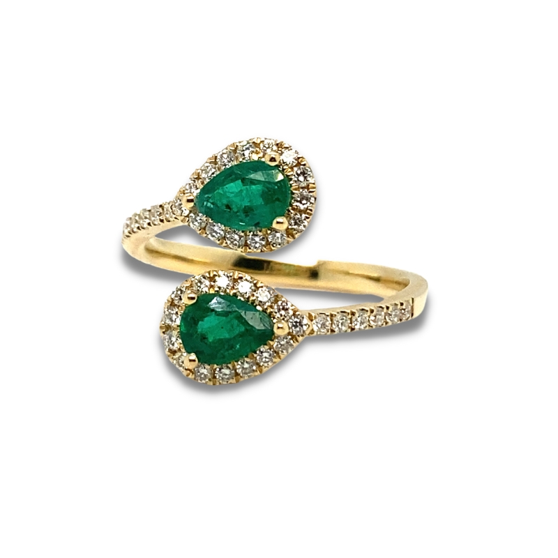 two gold rings with emeralds and diamonds