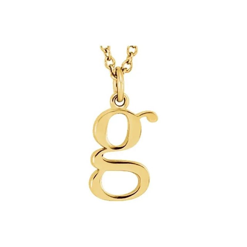 a gold necklace with the letter g on it
