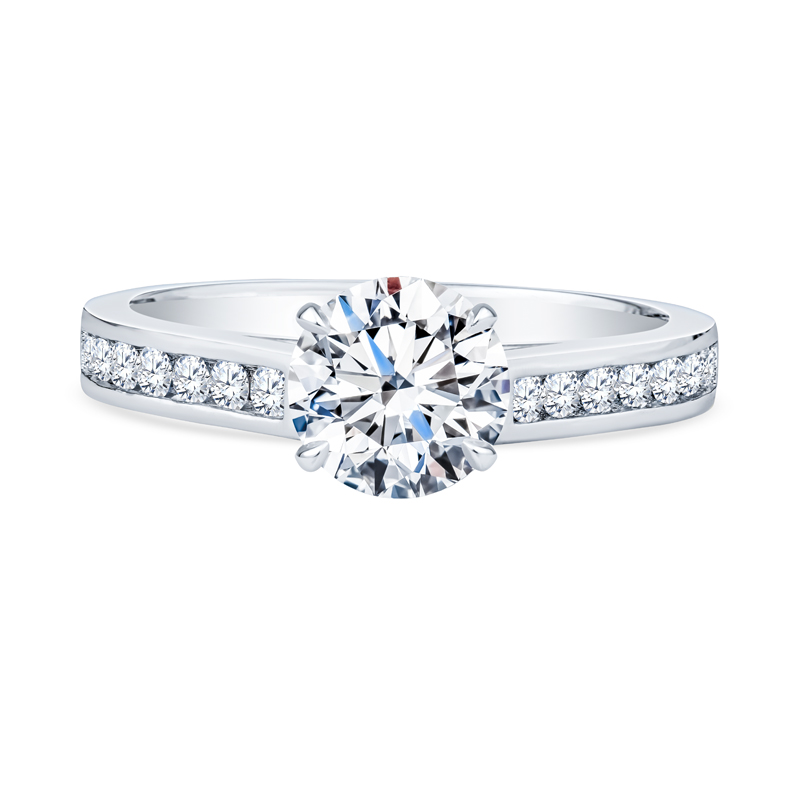 a white gold engagement ring with channel set diamonds