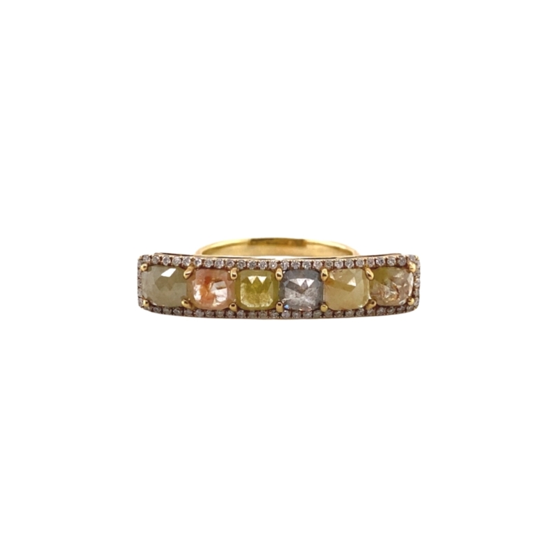 a gold ring with different colored stones