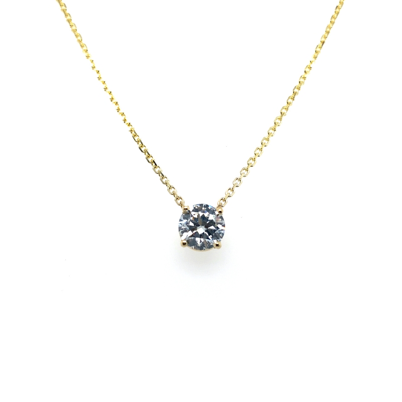 a necklace with a blue diamond on it