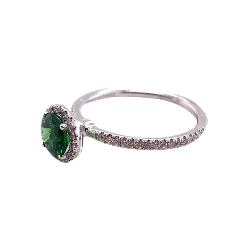 a ring with a green stone and diamonds