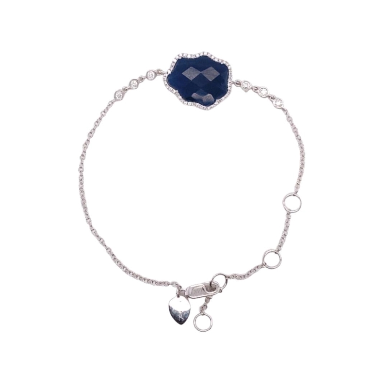 a bracelet with a blue stone and silver beads