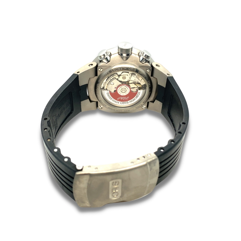 a watch is shown on a black bracelet