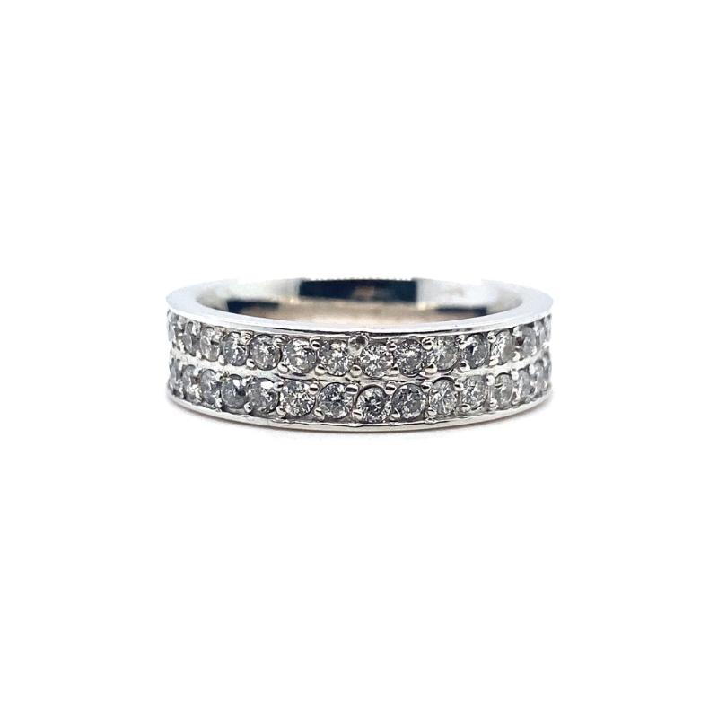 a wedding band with three rows of diamonds