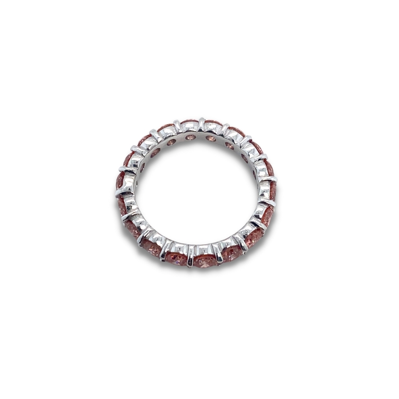 a red and white beaded bracelet on a white background