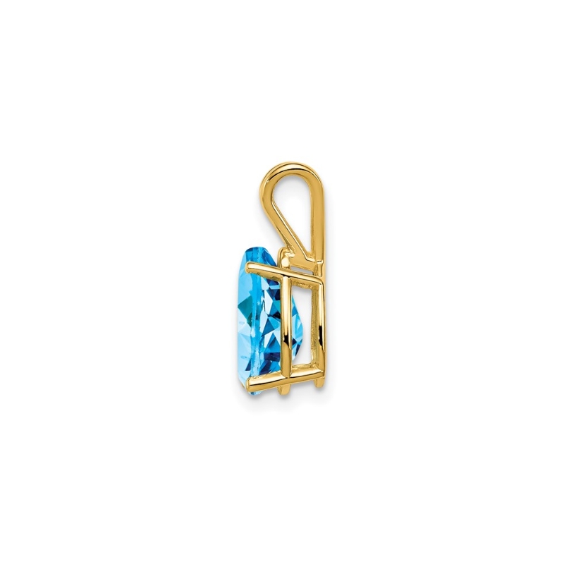 a gold pendant with a blue stone in it