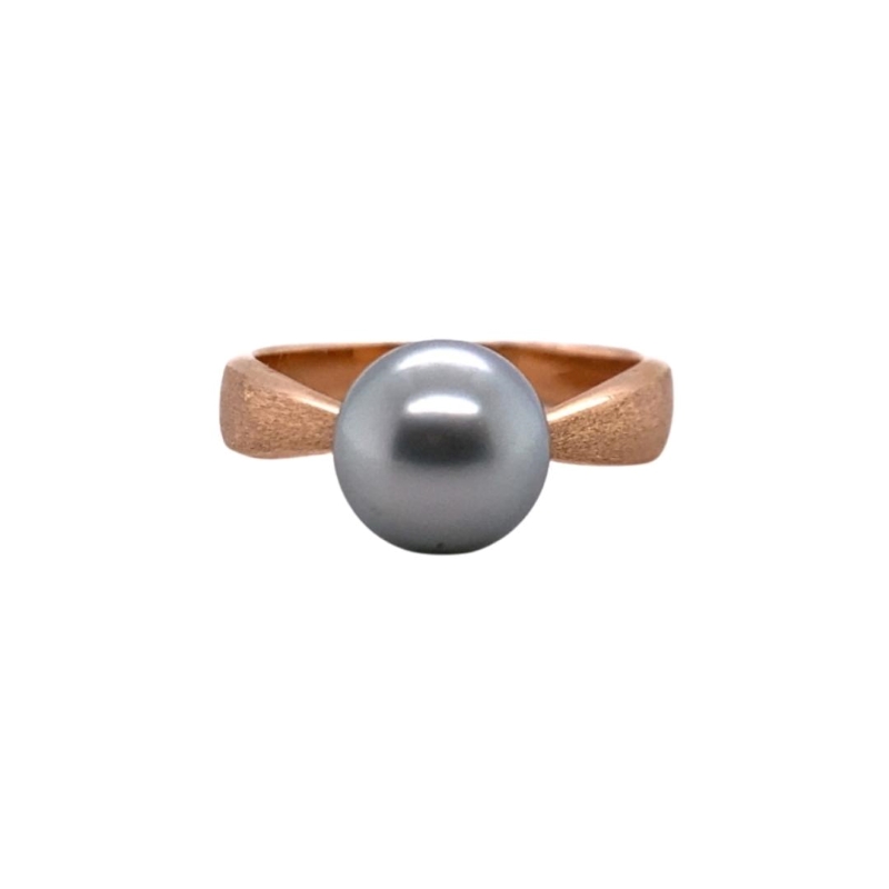 a ring with a gray pearl on it