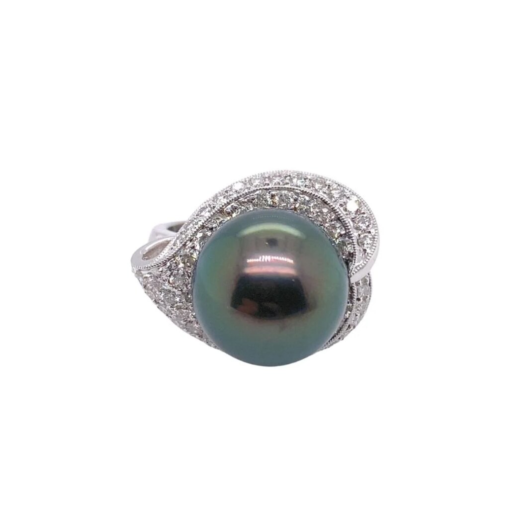 a black pearl and diamond ring