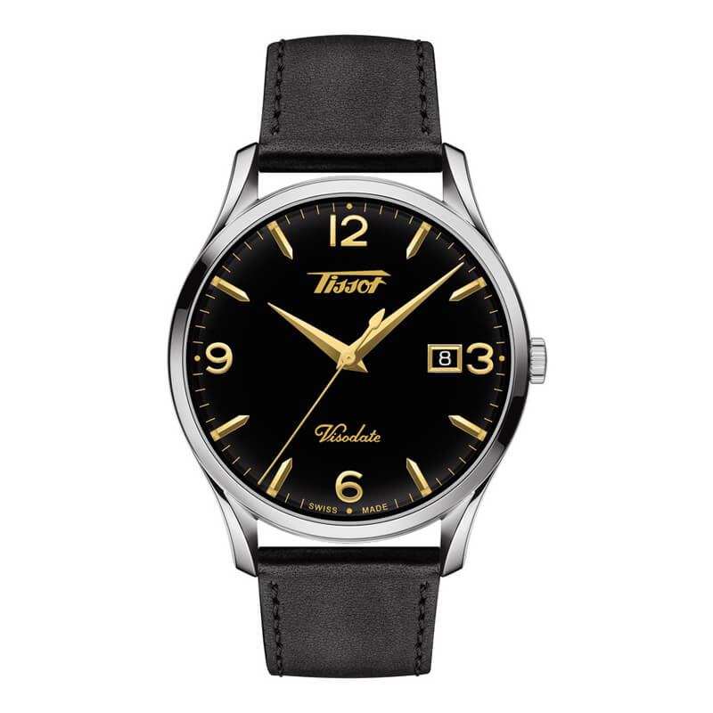 a black watch with gold numbers on it