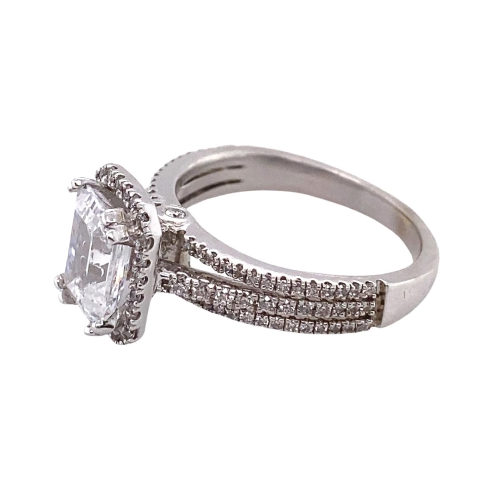 a white gold ring with a diamond and two rows of diamonds