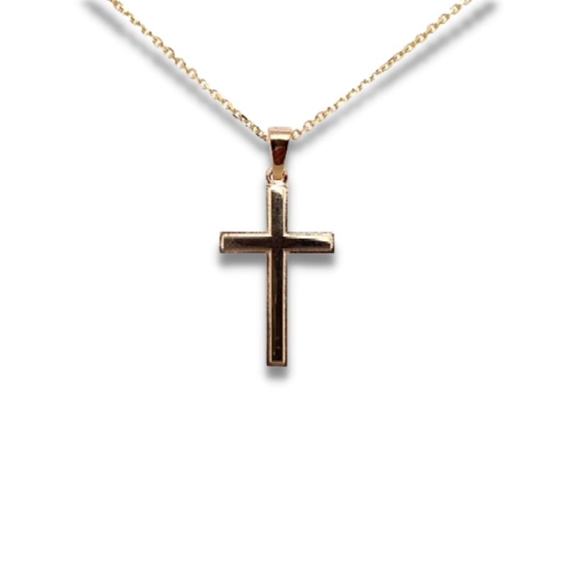 a gold cross necklace on a white background