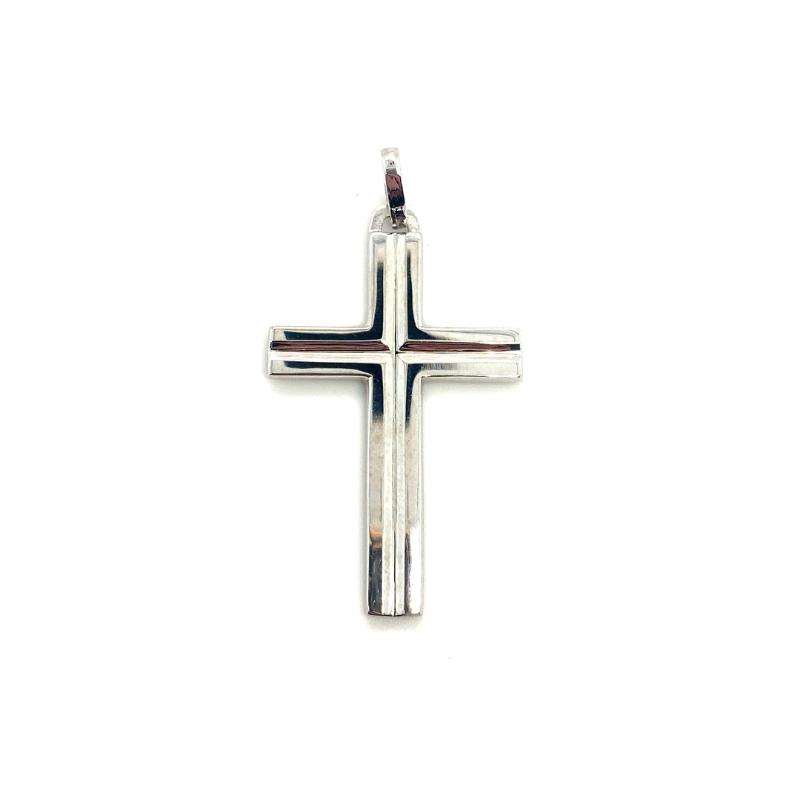 a silver cross on a white background