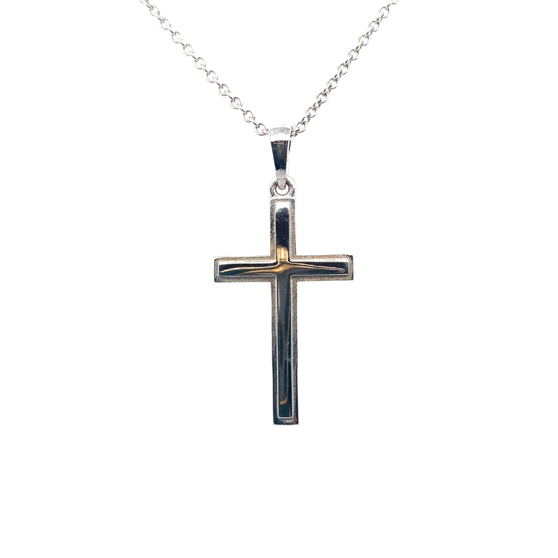 a cross pendant is shown on a chain
