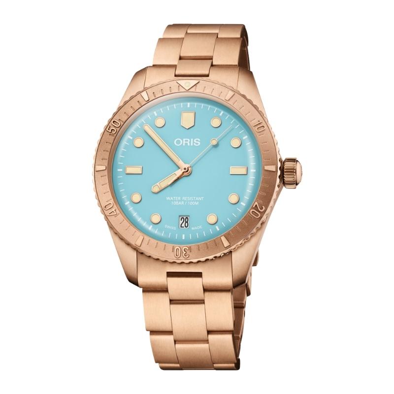 a gold watch with blue dials on a white background