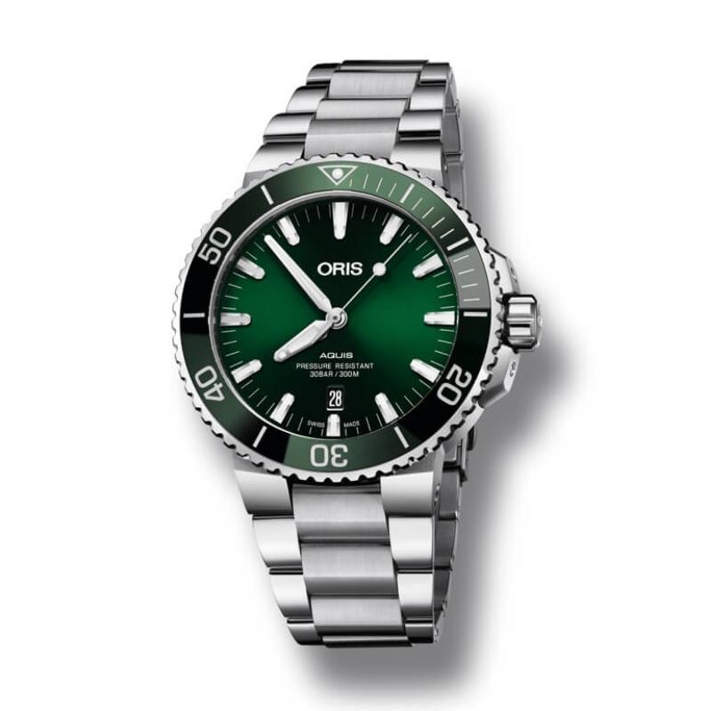 a watch with green dials on a steel bracelet
