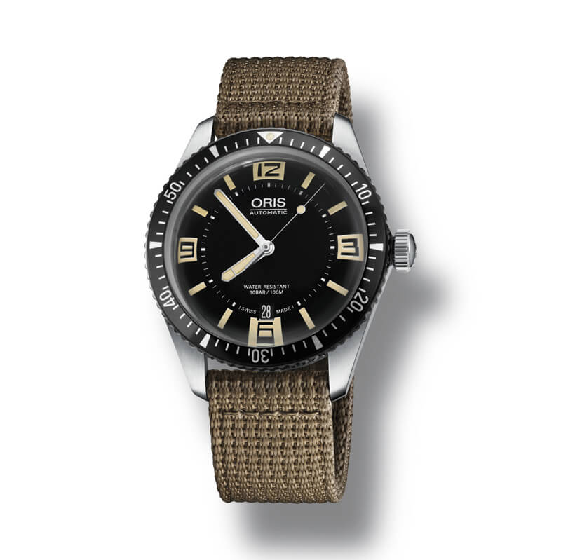 a watch with a black dial and brown strap