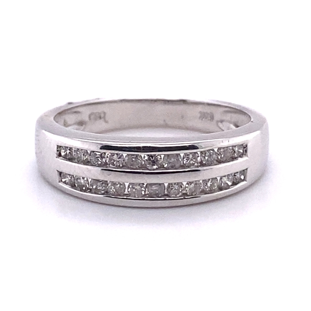 a white gold ring with channeled diamonds