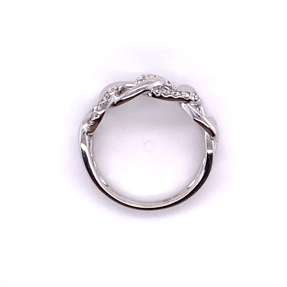 a silver ring on a white background