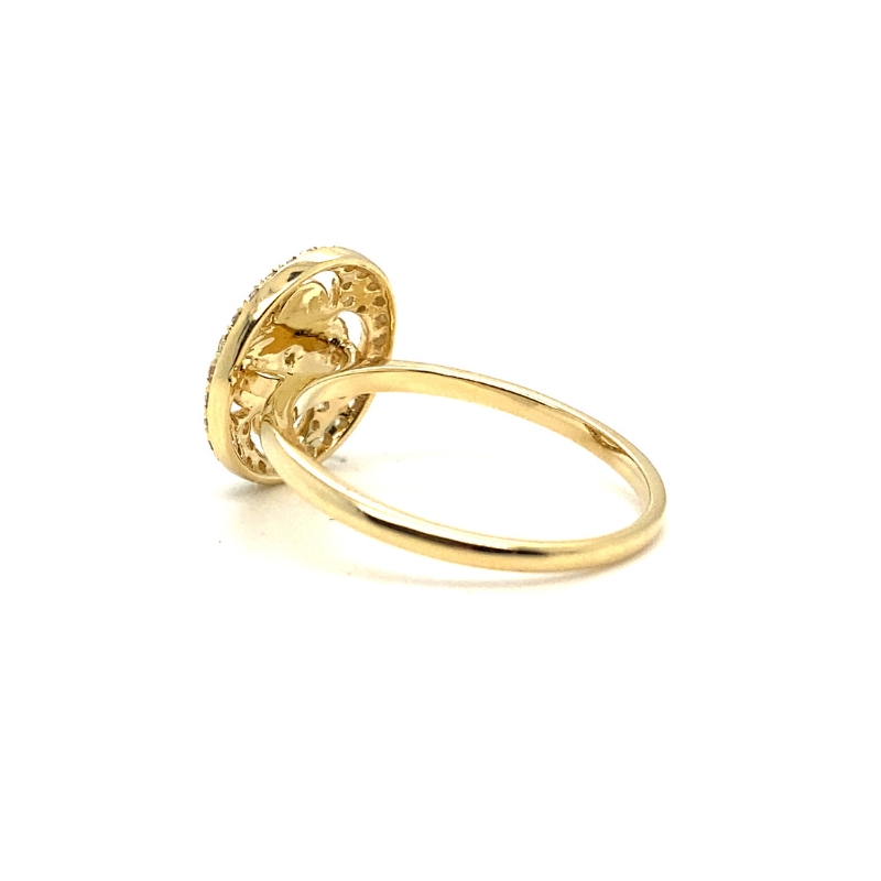 two yellow gold rings on a white background