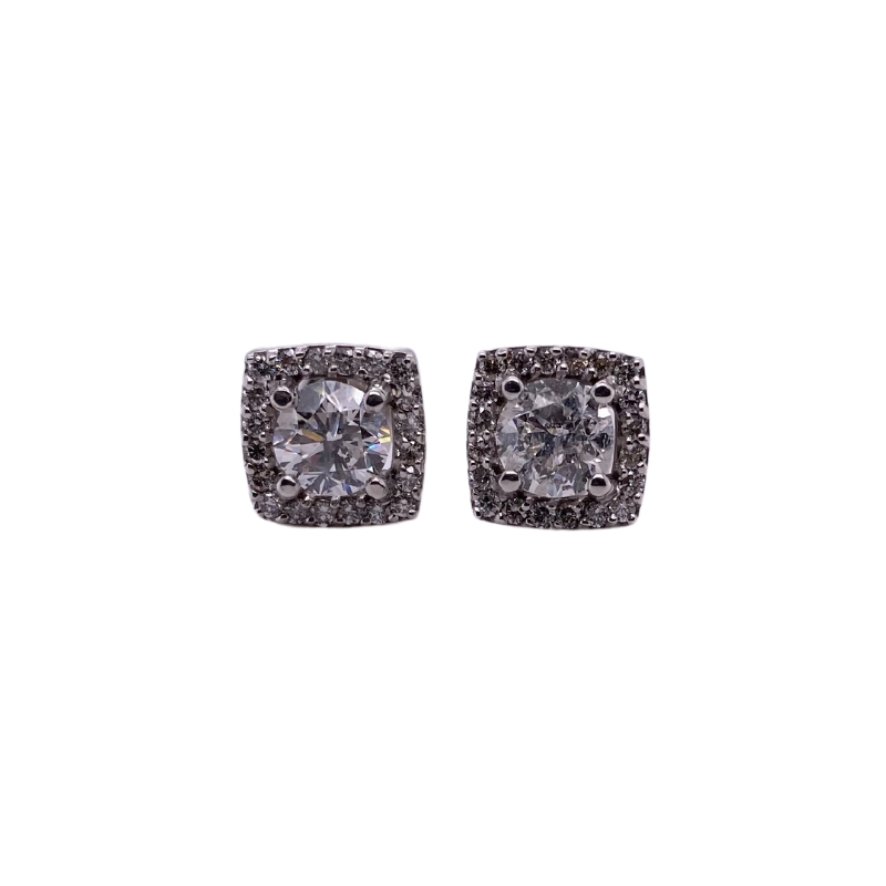 a pair of earrings with black and white diamonds
