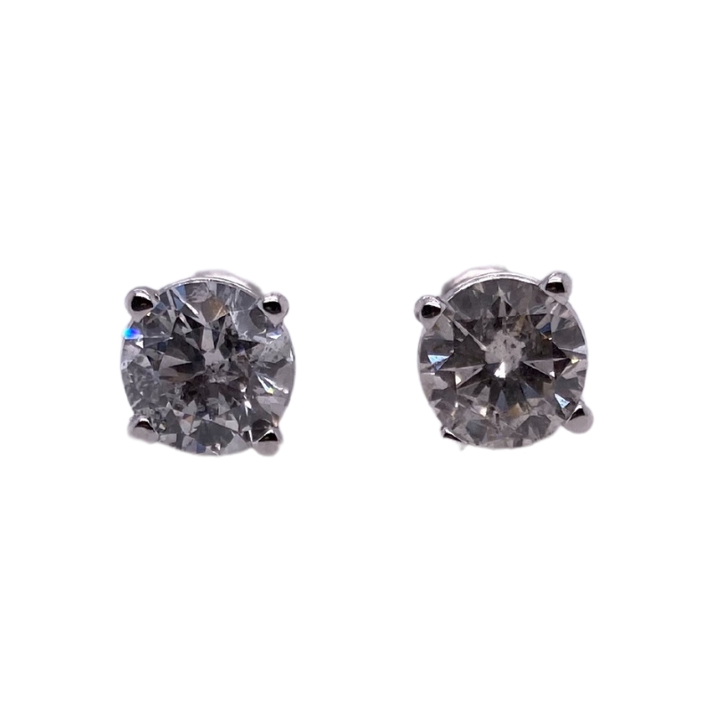 pair of diamond earrings on white background