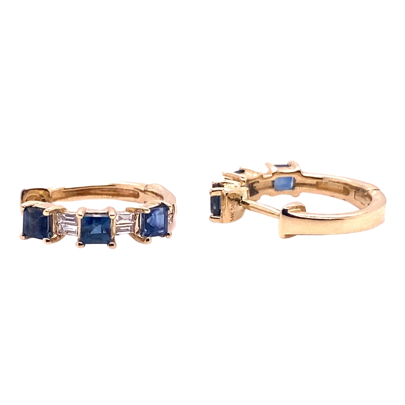 a pair of blue sapphire and diamond earrings
