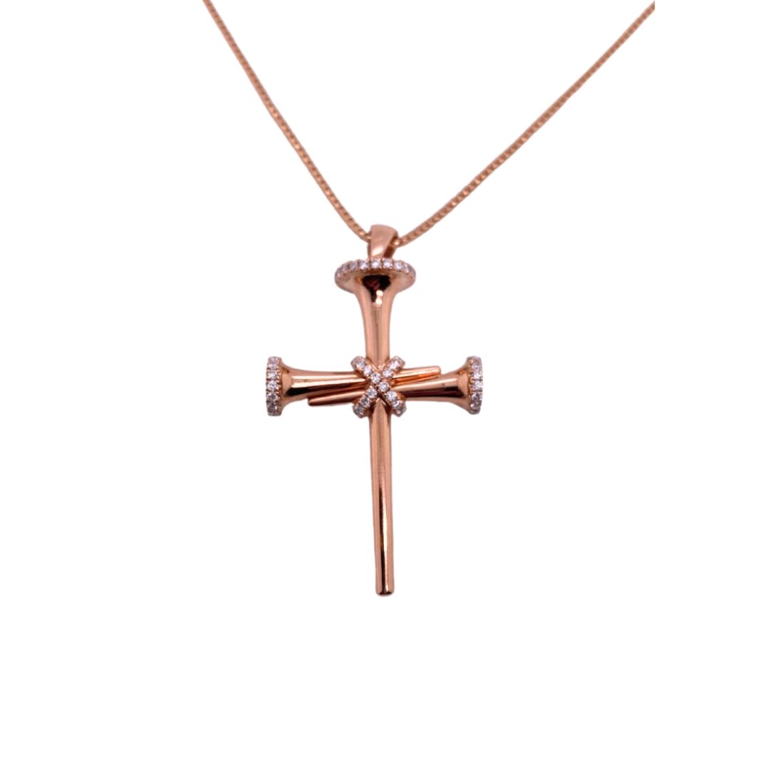 a rose gold cross necklace with diamonds