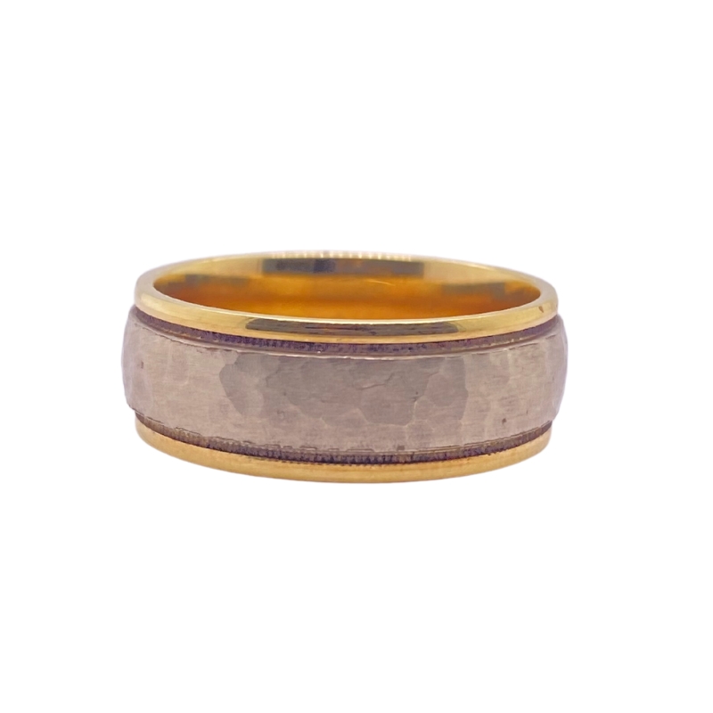 a gold and grey wedding ring