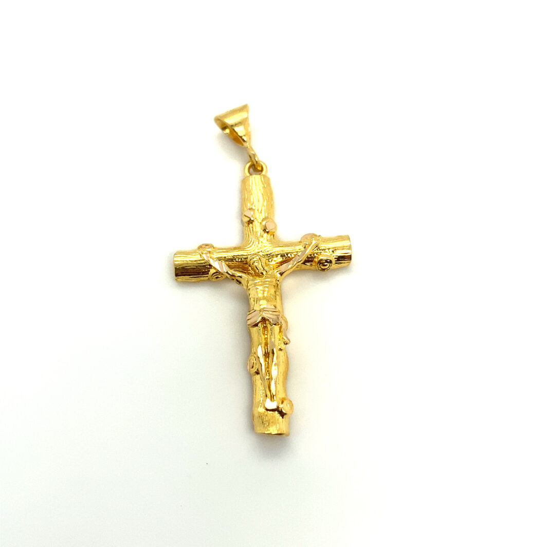 a gold cross is shown against a white background