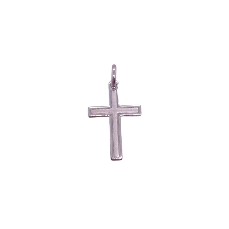 a cross pendant on a white background