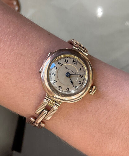 a close up of a person's wrist with a watch on it