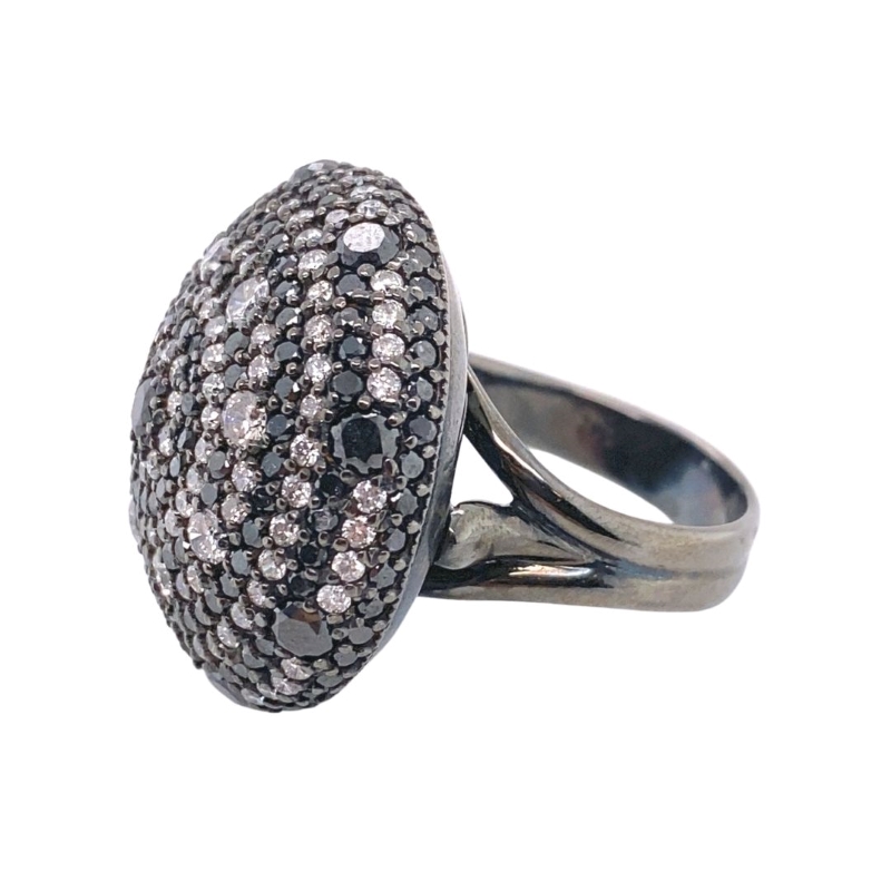 a black and white diamond ring on a white background