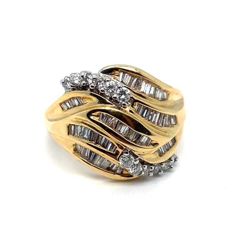 a gold and diamond ring on a white background