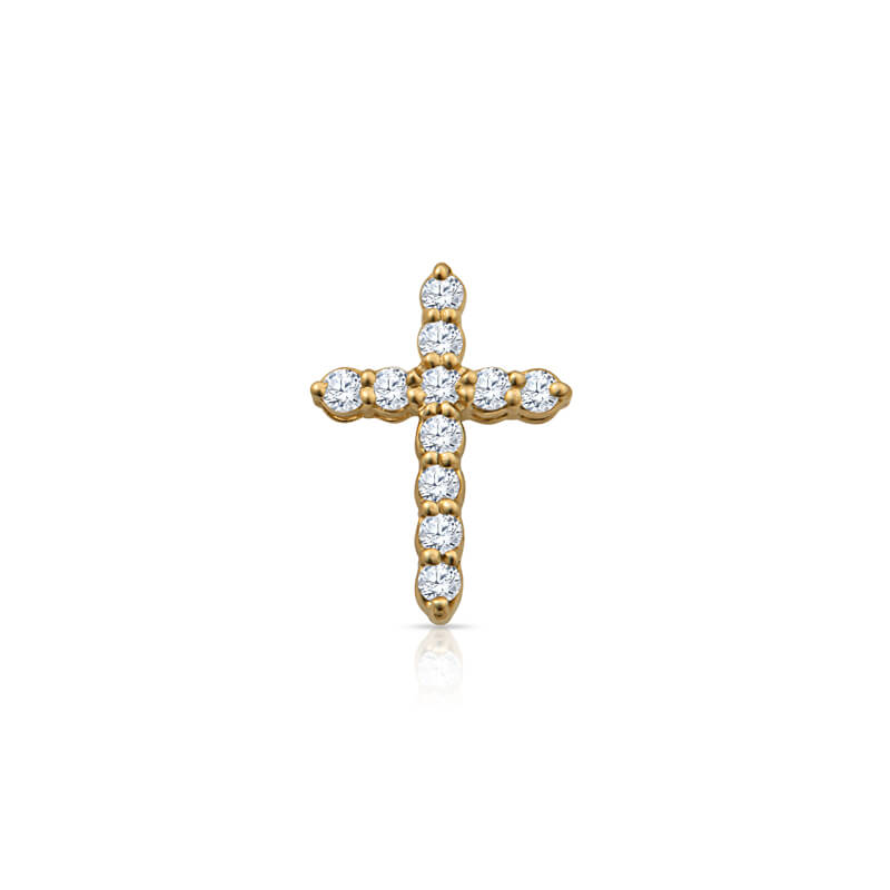 a gold cross pendant with diamonds on it