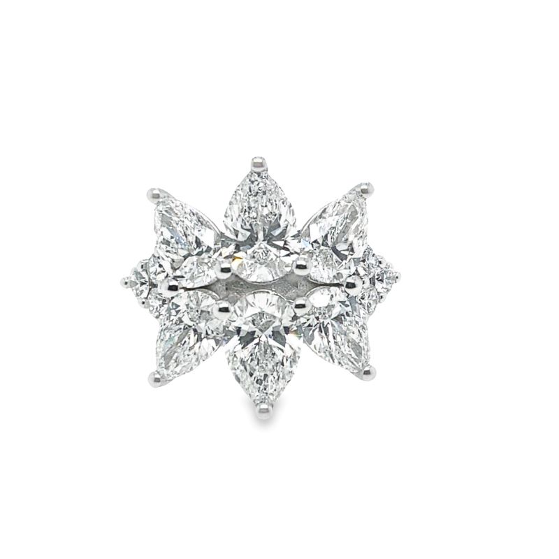 a diamond ring with three pieces of diamonds on it