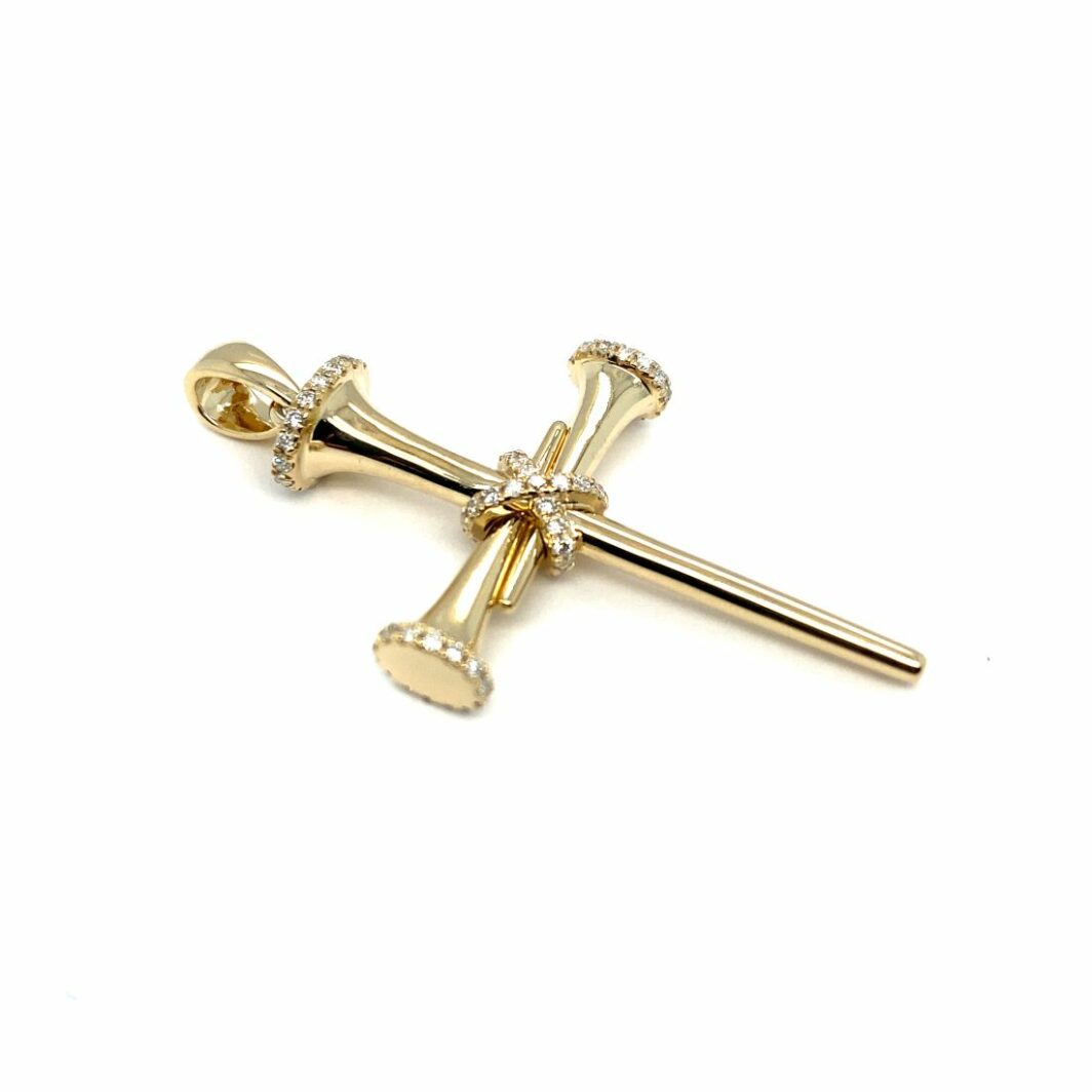 a gold cross with diamonds on it