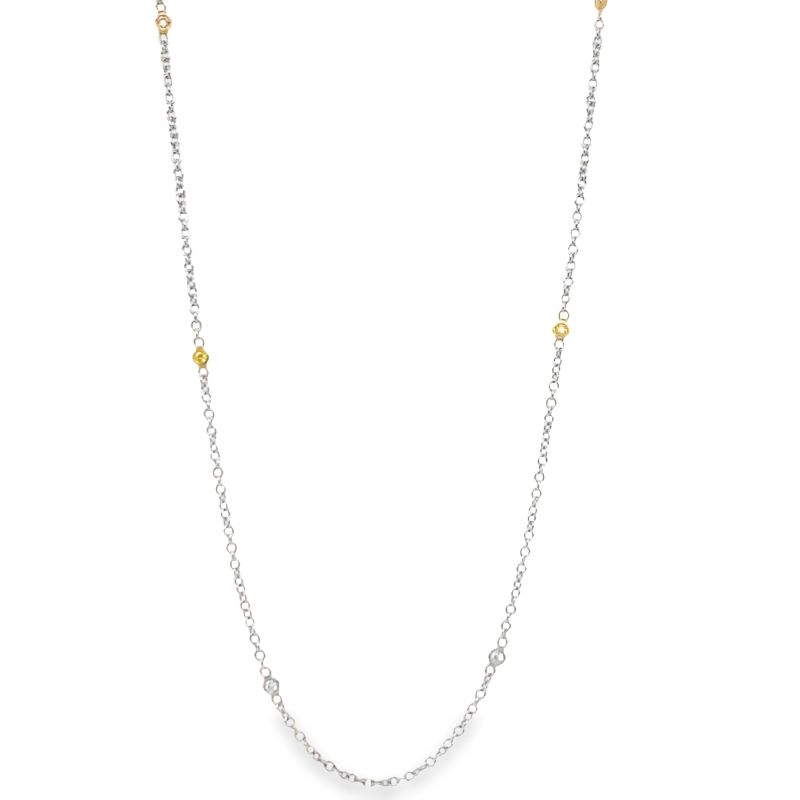 a long necklace with yellow and white beads