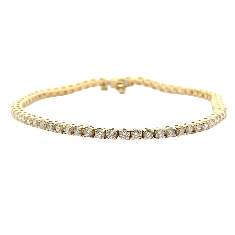 a gold bracelet with diamonds