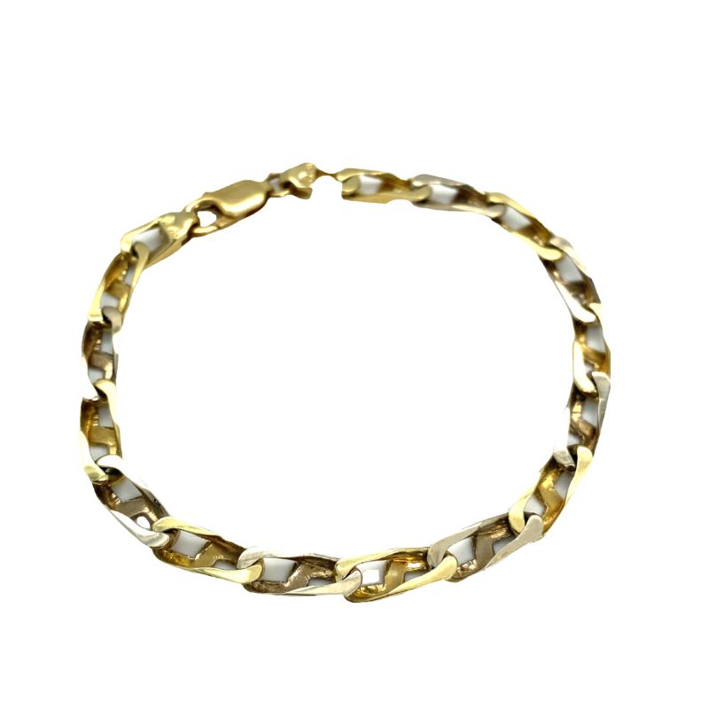 a gold and silver bracelet on a white background