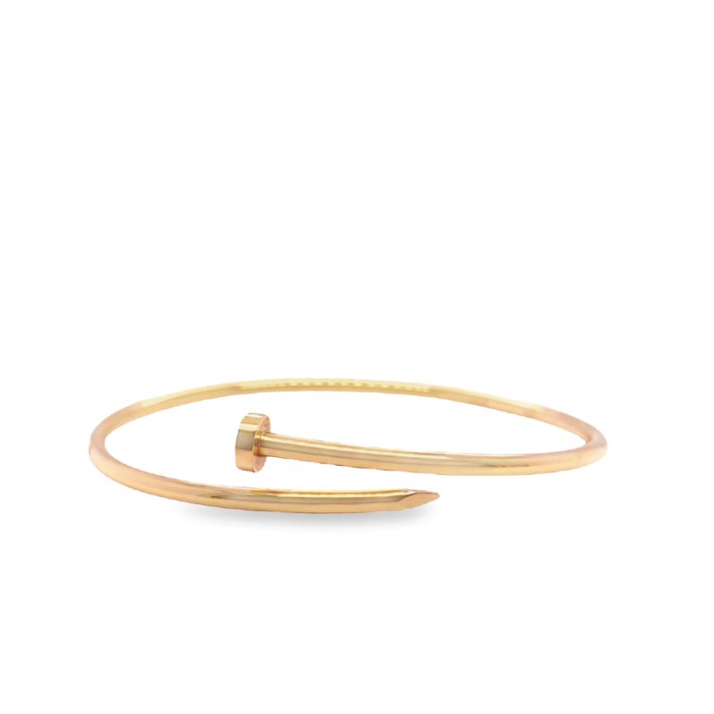 a gold plated ring with two curved bars