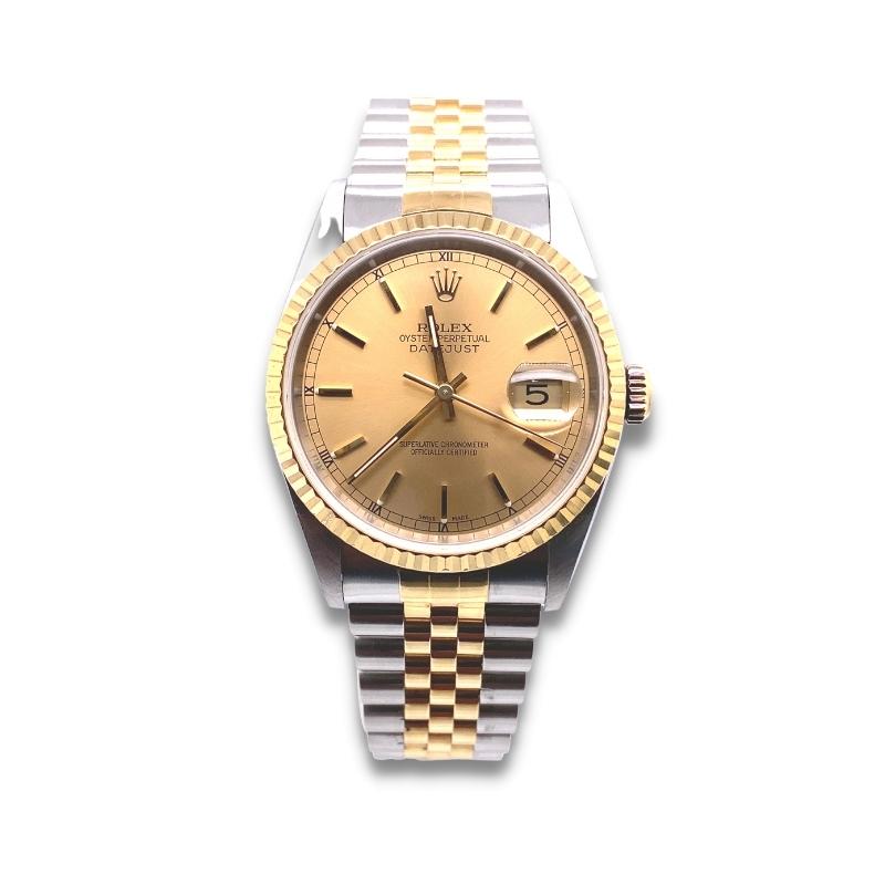 a rolex watch with two tone gold dial