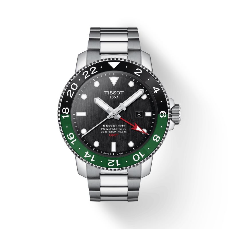 a watch with green and black dials