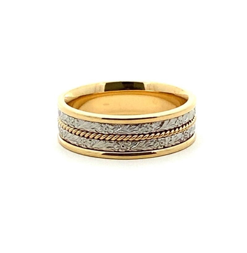 a yellow gold ring with two rows of diamonds