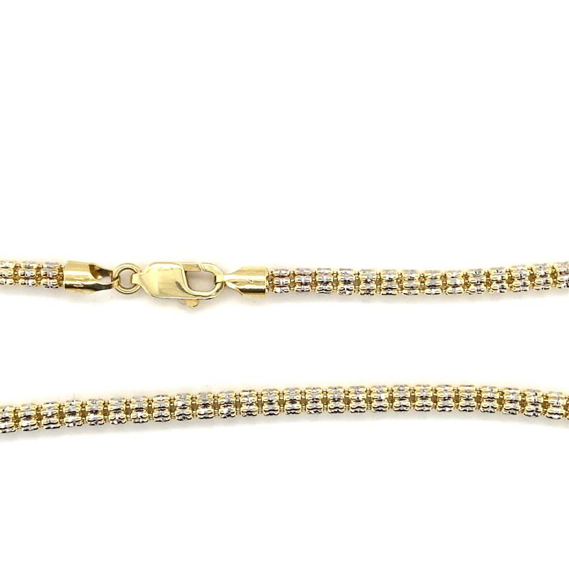 a yellow gold chain with white diamonds on it