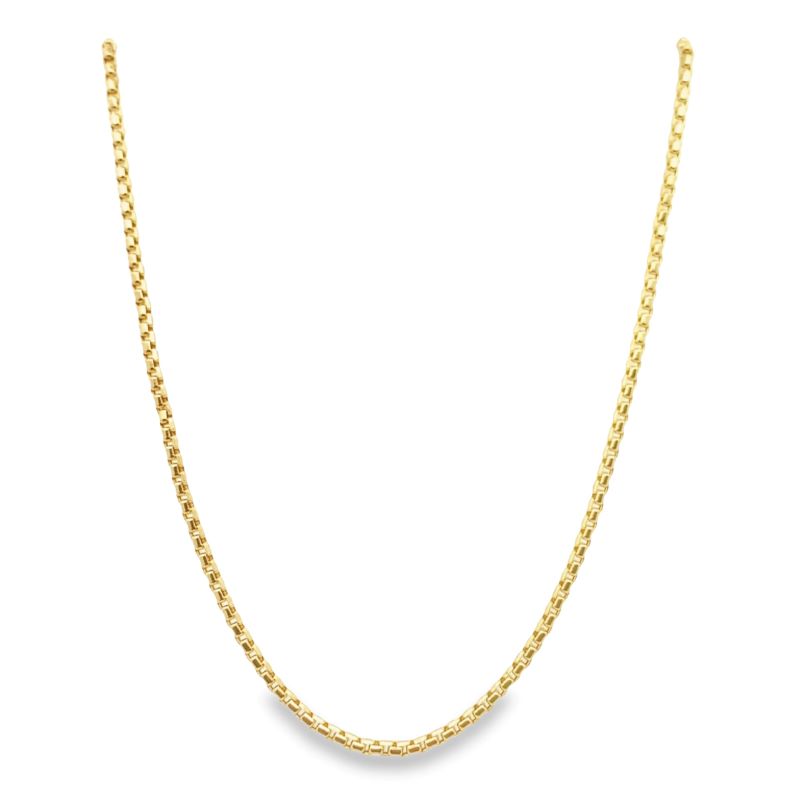 a gold chain on a white background