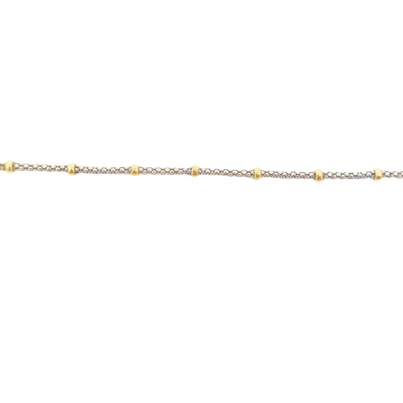 a yellow and white gold bracelet